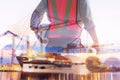 Double Exposure of Engineer in Safety Equipment on Shipping Terminal Industry Background, Technician Man Operator of Handling Royalty Free Stock Photo