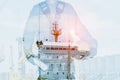 Double Exposure of Engineer in Safety Equipment in shipyard industry Background.