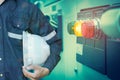 Double exposure of Engineer or Technician man holding safety hat