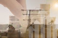 Double exposure gold coins money and construction background. Royalty Free Stock Photo