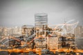 Double exposure of graph and coin stacks growing growth stacks with modern city.