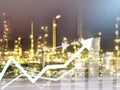 Double exposure graph economy and construction industry oil refinery background.