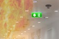 double exposure green emergency exit sign in hospital showing th Royalty Free Stock Photo