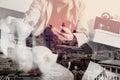 double exposure of hipster using smart phone and digital tablet