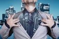 Double exposure image of a business man against a modern city background. The concept of the future of business and communication Royalty Free Stock Photo