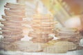 Double exposure of industrial and rows of coins