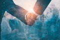 Double exposure-Industry investment,telecommunication business concept,businesspeople team join handshake,negotiate mergers and