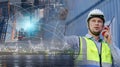 Double exposure of man engineering holding walkie-talkie portable of at container shipping.