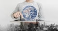 Double exposure, a man using on digital tablet and augmented reality technology. Element of this image are furnished by NASA Royalty Free Stock Photo