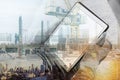 Double exposure, a man using digital tablet and buildings construction with cityscape Royalty Free Stock Photo