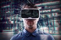 Double exposure, man wearing virtual reality goggles, night city Royalty Free Stock Photo