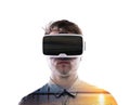 Double exposure. Man wearing virtual reality goggles. Sea at sunset. Royalty Free Stock Photo