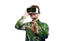 Double exposure. Man wearing virtual reality goggles. Trees. Royalty Free Stock Photo