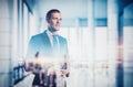 Double exposure of modern loft and businessman