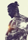 Double exposure : muscular young man and pine forest Royalty Free Stock Photo