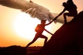 Double exposure of people climbing up mountain and helping hand Royalty Free Stock Photo