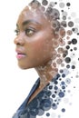 A double exposure portrait of an African American woman combined with digital art. Royalty Free Stock Photo