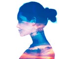 Double exposure portrait of beautiful girl in profile. Young woman and sunset or sunrise Royalty Free Stock Photo