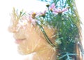 Double exposure close up portrait of a young pretty woman interwoven with bright leaves and flowers of a vibrant tropical tree Royalty Free Stock Photo