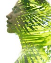 A double exposure portrait young woman profile with her eyes closed against white background and palm tree leaves Royalty Free Stock Photo