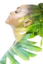 A double exposure profile portrait of a woman combined with foliage. Unity with nature. Royalty Free Stock Photo