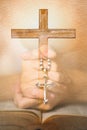 Christianity rosary of jesus cross in hands of woman praying for god blessing Royalty Free Stock Photo