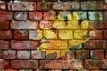 Double exposure rough old brick wall and yellow maple leaf Royalty Free Stock Photo