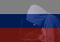 Double exposure of Russian flag and Anonymous hooded hacker