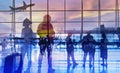 Double exposure silhouettes of passenger walking at airport with people. Business airline concept