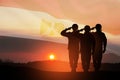 Double exposure of silhouettes of a soliders and the sunset or the sunrise against flag of Egypt.