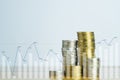 Double exposure Stacks of coins on working table witg financial