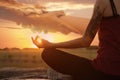 Double exposure of woman meditating and hands reaching each other outdoors at sunset. Yoga helping in daily life: harmony