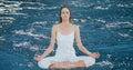 Double exposure of woman meditating over lake Royalty Free Stock Photo
