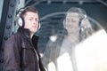 Double exposure of young man with headphones