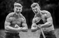 Double force power. Masculinity and brutality concept. Men with sexy muscular torsos look brutally. Achieving success in