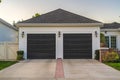 Double garage with short driveway in day
