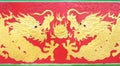 Double golden dragon painting playing fire ball on red background