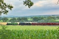Double header steam trains in glorious countryside