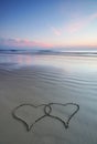 Double heart shape on the beach