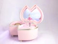 Ballerina pink Music box with purplish background.