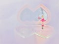 Ballerina pink Music box with purplish blurs background.