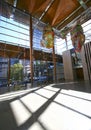 Atrium of Auckland Art Gallery Toi o TÃÂmaki with dendriform canopy ceiling and colorful hung blob artwork, New Zealand