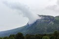 Double Hydnefossen waterfall shrouded in incredible clouds and fog, Norway