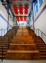 Double internal wooden staircase with metal handrail Royalty Free Stock Photo