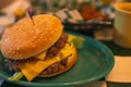 Big classic beef cheese burger. Double meet Burger with melting cheddar cheese. Cheeseburger burger with double cutlet