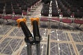 Double microphone on a glass round side table at conference hall Royalty Free Stock Photo