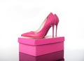 Double pink pointed high heels women`s shoe and box Royalty Free Stock Photo