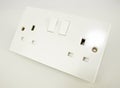 A double plug socket with switch for a british plug Royalty Free Stock Photo