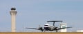 Double propeller plane on runway