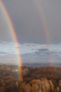 Double rainbow against the sunset sky. Leprechaun at the end of the rainbow. Rainbow as a concept of fantastic money Royalty Free Stock Photo